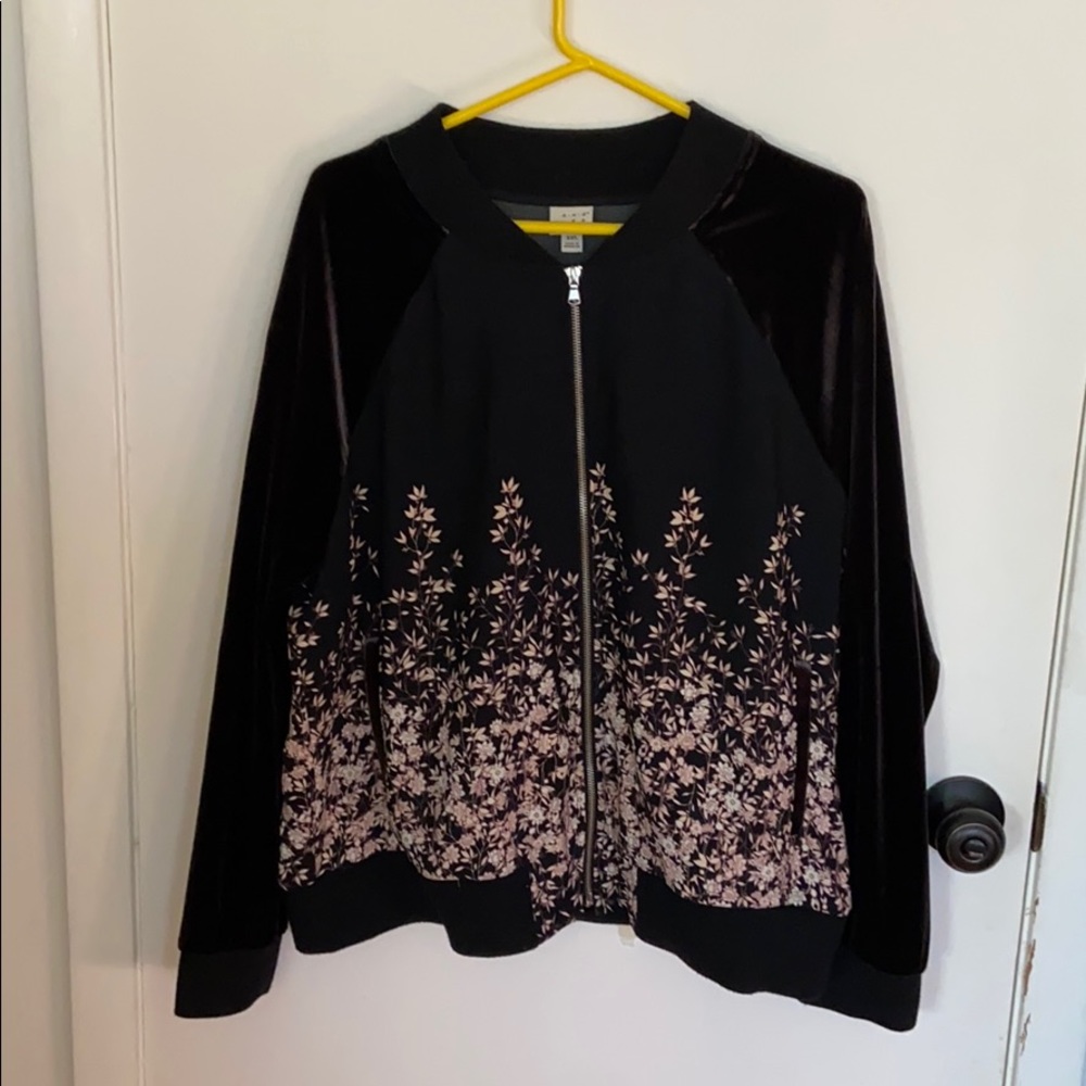 Black with pink flowers jacket with velour arms.